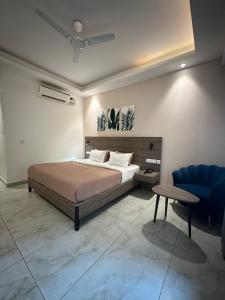 Katil atau katil-katil dalam bilik di Flock Hotel I Golf Course Road Near Dlf Phase 1 Metro station I Gurugram