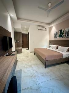 Katil atau katil-katil dalam bilik di Flock Hotel I Golf Course Road Near Dlf Phase 1 Metro station I Gurugram