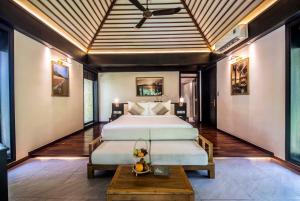 Ein Bett oder Betten in einem Zimmer der Unterkunft Hon Tam Resort