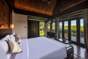 Ein Bett oder Betten in einem Zimmer der Unterkunft Hon Tam Resort