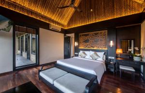 Ein Bett oder Betten in einem Zimmer der Unterkunft Hon Tam Resort