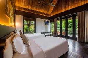 Ein Bett oder Betten in einem Zimmer der Unterkunft Hon Tam Resort