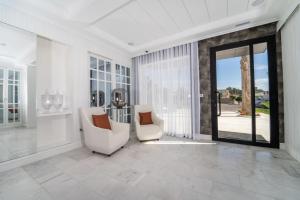 Posezení v ubytování Petit Palace Suites Hotel