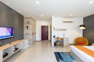 TV a/nebo společenská místnost v ubytování CDX RESIDENCE