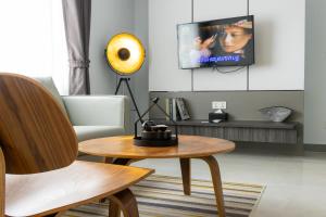 TV a/nebo společenská místnost v ubytování CDX RESIDENCE