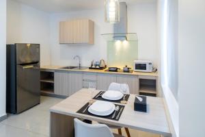 Kuchyň nebo kuchyňský kout v ubytování CDX RESIDENCE