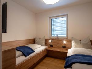Letto o letti in una camera di Ferienwohnung Klocker