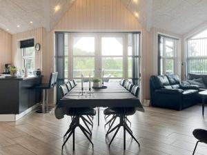 Posezení v ubytování 8 person holiday home in Roslev-By Traum