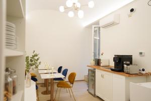 Kuchyň nebo kuchyňský kout v ubytování Charm&Bella GuestHouse
