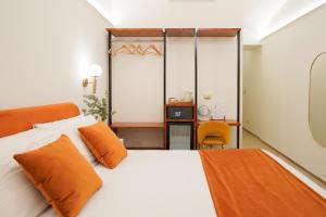 Postel nebo postele na pokoji v ubytování Charm&Bella GuestHouse