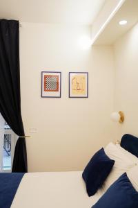 Postel nebo postele na pokoji v ubytování Charm&Bella GuestHouse