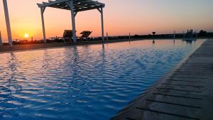 The swimming pool at or close to Il giardino dei tramonti