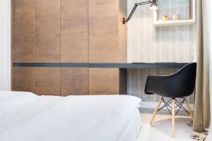 Łóżko lub łóżka w pokoju w obiekcie Elite Apartments Rezydencja Marina
