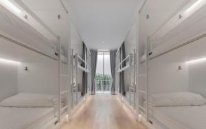 Matini Hostel grandstation客房内的一张或多张床位