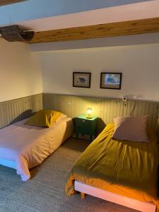 Postel nebo postele na pokoji v ubytování Le 44