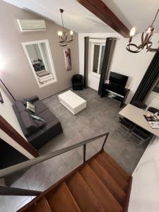 an aerial view of a living room at Cannes City Suites in Cannes