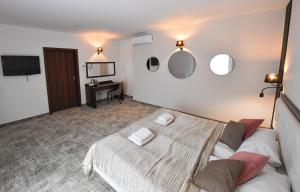Posteľ alebo postele v izbe v ubytovaní Hotel Focus Centrum Konferencyjne