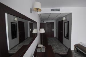 Posteľ alebo postele v izbe v ubytovaní Hotel Focus Centrum Konferencyjne