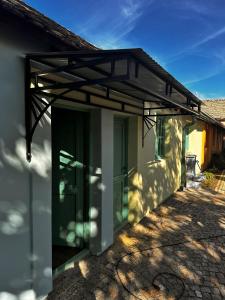 a pergola on the side of a house at PRESIDENT APARTMANI - Spa apartman, Fenix apartman, Galerija apartman in Šabac