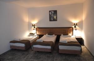 Posteľ alebo postele v izbe v ubytovaní Hotel Focus Centrum Konferencyjne