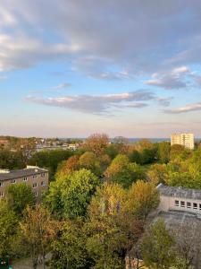 an overhead view of a city with trees and buildings at Gdynia z widokiem na morze by Downtown Apartments in Gdynia