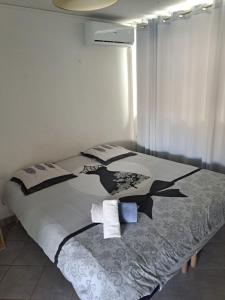 Postelja oz. postelje v sobi nastanitve GREG HOUSE