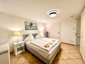 Ein Bett oder Betten in einem Zimmer der Unterkunft Penthouse-Berta