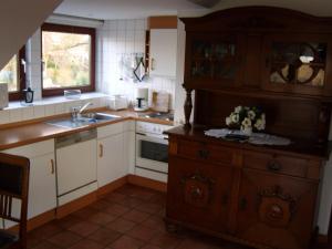 a kitchen with a sink and a counter top at FeWoFahrdorf in Fahrdorf