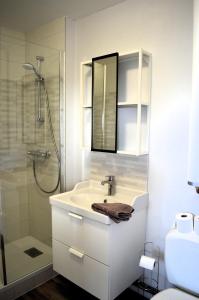 Kúpeľňa v ubytovaní Appartement au pied de la plage - Balcon - Parking