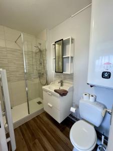 Kúpeľňa v ubytovaní Appartement au pied de la plage - Balcon - Parking