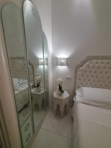 Postel nebo postele na pokoji v ubytování Hotel Al Cavallino Bianco