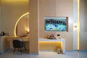TV a/nebo společenská místnost v ubytování Concorde Creek View Hotel Bur Dubai