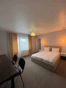 Postel nebo postele na pokoji v ubytování Imperial Hotel