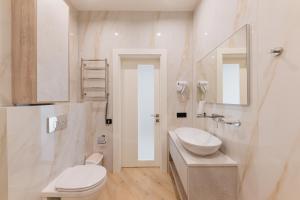 Koupelna v ubytování MM GROUP APARTMENT GOLD