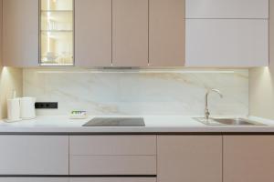 Kuchyň nebo kuchyňský kout v ubytování MM GROUP APARTMENT GOLD + 37 fotografií