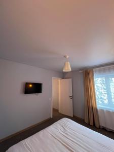 Postel nebo postele na pokoji v ubytování Imperial Hotel