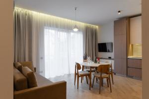 TV a/nebo společenská místnost v ubytování MM GROUP APARTMENT GOLD