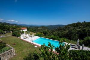 Gallery image of 206 - Appartamento Betulla, giardino e piscina - Residence Cherry House in Carro +44 photos