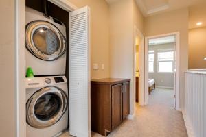a laundry room with a washing machine and a washer and dryer at Milpitas 1br w ac nr movies mall dining SFO-1639 in Milpitas