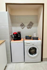 Kuchyň nebo kuchyňský kout v ubytování Napulè house - Napoli appartamento in centro