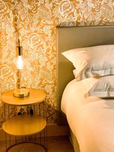 Łóżko lub łóżka w pokoju w obiekcie Cosy Room Paris