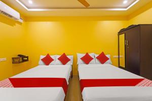 Postel nebo postele na pokoji v ubytování Hotel O Jayam Residency + 37 fotografií