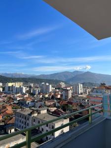 a view of a city from a balcony at Home Sweet Home in Elbasan