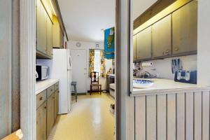 Virtuvė arba virtuvėlė apgyvendinimo įstaigoje Treetop Chalet