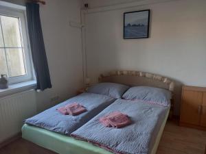Postel nebo postele na pokoji v ubytování Apartmán Lanžhot