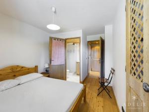 Appartement Montvalezan-La Rosière, 3 pièces, 6 personnes - FR-1-398-542にあるベッド