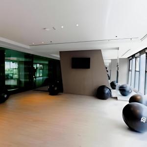 an empty room with black balls on the floor at THE BASE apartments at central pattaya in Pattaya Central