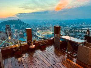 a balcony of a building with a view of a city at Amontana Luxury Hôtel in Antananarivo