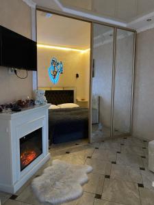 Кровать или кровати в номере avalon apartment in Lviv