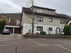 a house with a car parked in front of it at Sterngässle in Deggingen